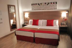 Postel nebo postele na pokoji v ubytování Hotel Best Auto Hogar