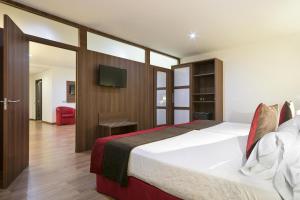 Postel nebo postele na pokoji v ubytování Hotel Best Auto Hogar