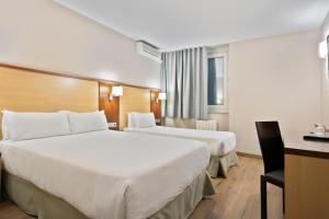 Katil atau katil-katil dalam bilik di Hotel Best Andorra Center