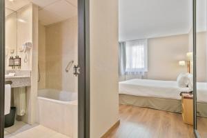 Katil atau katil-katil dalam bilik di Hotel Best Andorra Center
