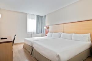 Katil atau katil-katil dalam bilik di Hotel Best Andorra Center