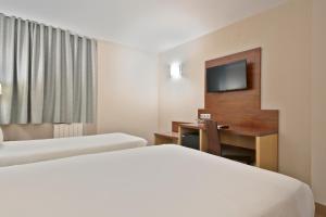 Katil atau katil-katil dalam bilik di Hotel Best Andorra Center