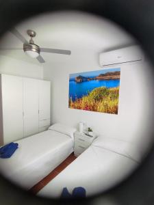 Cama o camas de una habitación en Apartamento El Flamenco Azul Cabo de Gata