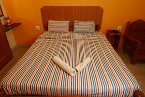 Voodi või voodid majutusasutuse MM Resorts toas