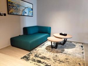 Posezení v ubytování Golden Tulip El Mechtel