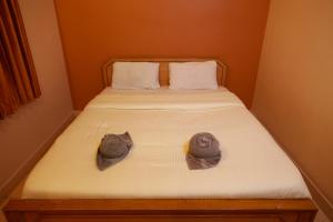 Voodi või voodid majutusasutuse MM Resorts toas