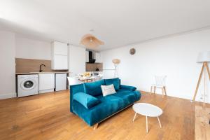 Kuchyň nebo kuchyňský kout v ubytování Charmand duplex avec vue sur la cité & les toits + 8 fotografií