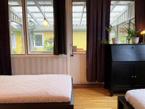 Katil atau katil-katil dalam bilik di Well-equipped holiday home in Varnamo