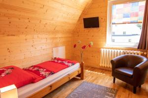 Ένα ή περισσότερα κρεβάτια σε δωμάτιο στο Ferienwohnungen in Göhren