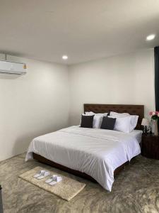Postel nebo postele na pokoji v ubytování ช่องลม แคมป์ เขาค้อ