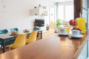TV a/nebo společenská místnost v ubytování Casa Playa Roquetas