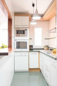 Kuchyň nebo kuchyňský kout v ubytování Casa Playa Roquetas