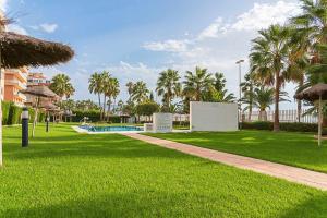 Bazén v ubytování Casa Playa Roquetas nebo v jeho okolí
