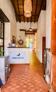 A kitchen or kitchenette at Maria Mulata Boutique Hotel