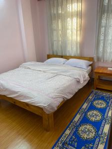 Postel nebo postele na pokoji v ubytování Himalayan Vacation Home