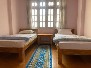 Postel nebo postele na pokoji v ubytování Himalayan Vacation Home