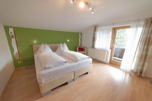 Postel nebo postele na pokoji v ubytování Haus Wegscheider