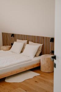 Postel nebo postele na pokoji v ubytování MASØN Jakubovice - luxusní chata s privátní vířivkou