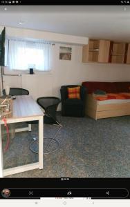 TV a/nebo společenská místnost v ubytování Gästezimmer Neumann