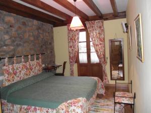 Cama ou camas em um quarto em Posada Montero de la Concha
