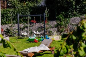Vonkajšia záhrada v ubytovaní Nowoczesne Apartamenty typu Superior - Bulwary Rabka Zdrój - Balia - Blisko Park Zdrojowy