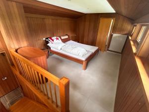 Katil atau katil-katil dalam bilik di Idyllisches Einfamilienhaus bei München