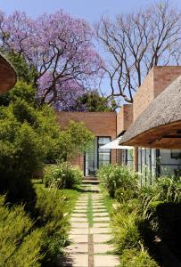 a brick building with a walkway in front of it at Satyagraha House in Johannesburg