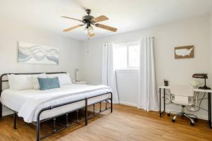 a bedroom with a bed with a ceiling fan at 2 bed 2 bath Modern Farmhouse in Old Town Spring in Spring