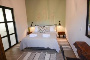 Posteľ alebo postele v izbe v ubytovaní Anassa Mountain House + 37 fotografií