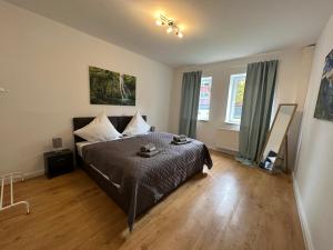 Postel nebo postele na pokoji v ubytování modernes und gemütliches Gartenapartent für 5-6 Pers.*zentral*Netflix*TOP