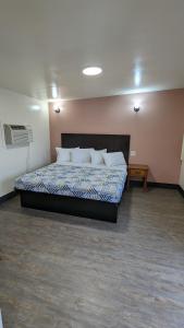 Cama o camas de una habitación en Portland Value Inn