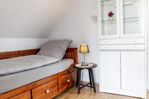 Postel nebo postele na pokoji v ubytování Elbpanorama Lauenburg