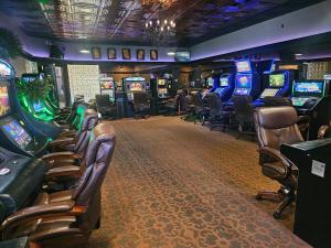 a casino with a bunch of slot machines at Broadway Inn Conference Center in Missoula