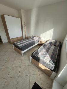 Postel nebo postele na pokoji v ubytování Ubytování Pardubice Trnová