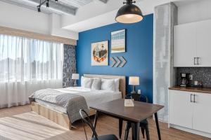 Cannery Lofts Niagara客房内的一张或多张床位