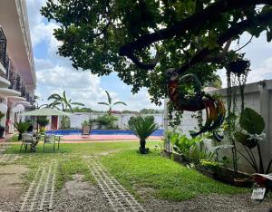a view of the yard of a house at HOTEL MILIN in Villa Comaltitlán