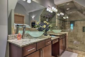 a bathroom with two sinks and a large mirror at Atlanta Forest Sanctuary home in Atlanta