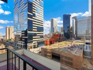 a view of a city skyline with tall buildings at Larimer Square, Parking included, at The Windsor in Denver