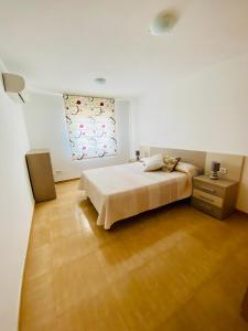 Postel nebo postele na pokoji v ubytování Villa Sant Rafel