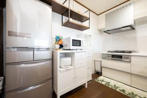Kuchyň nebo kuchyňský kout v ubytování Atami SANKAITEN with Private ONSEN-vacation rental