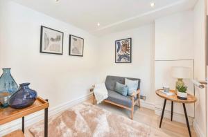 a living room with a couch and a table at Charming Winchester Retreat in Winchester