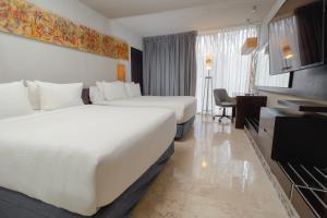 Katil atau katil-katil dalam bilik di Courtyard by Marriott Tuxpan Veracruz
