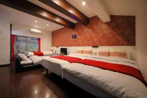 Un pat sau paturi într-o cameră la Gao Xiang -TENGACHAYA- - Vacation STAY 84156v