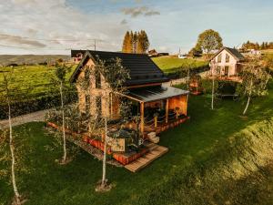 an aerial view of a house with trees at Domki Bliżej Natury Rabka-Zdrój in Rabka