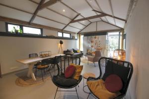 Χώρος καθιστικού στο Bed & Breakfast De Ruige Weide