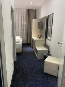 Koupelna v ubytování Gastpark Hotel