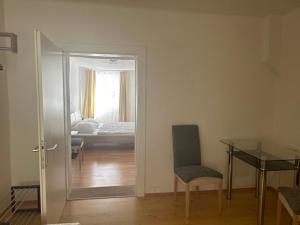 Postel nebo postele na pokoji v ubytování Spitz West