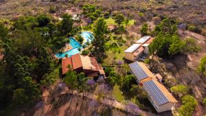 an aerial view of a resort with a pool at Hotel Fazenda Bonjuá in Montes Claros