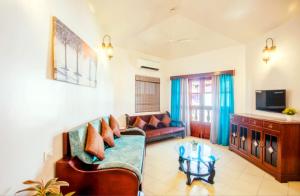 Zona d'estar a 'Golden Sand Dunes' 1bhk Benaulim beach apartment