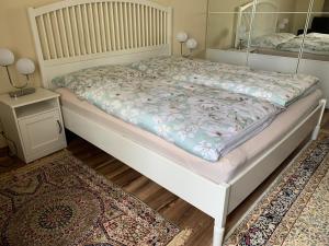Posteľ alebo postele v izbe v ubytovaní APARTMEN PRAHA